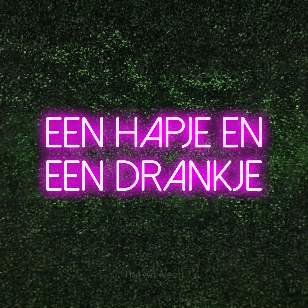 LED neon sign reading “Een Hapje En Een Drankje”, arranged in 2 lines.