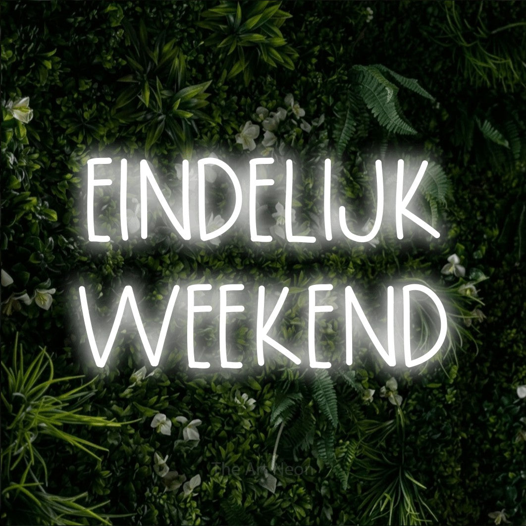 LED neon sign reading “EINDELIJK WEEKEND”, arranged in 2 lines.