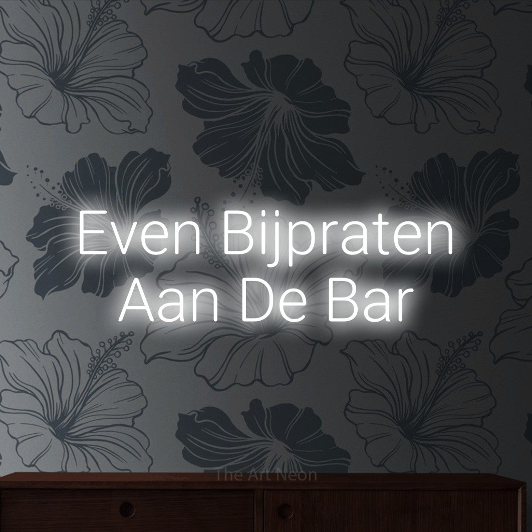 LED neon sign reading “Even Bijpraten Aan De Bar”, arranged in 2 lines.