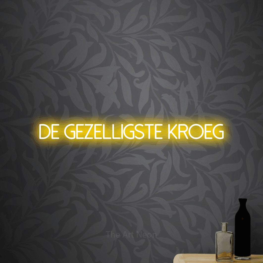 LED neon sign reading “De Gezelligste Kroeg”, arranged in a single line.