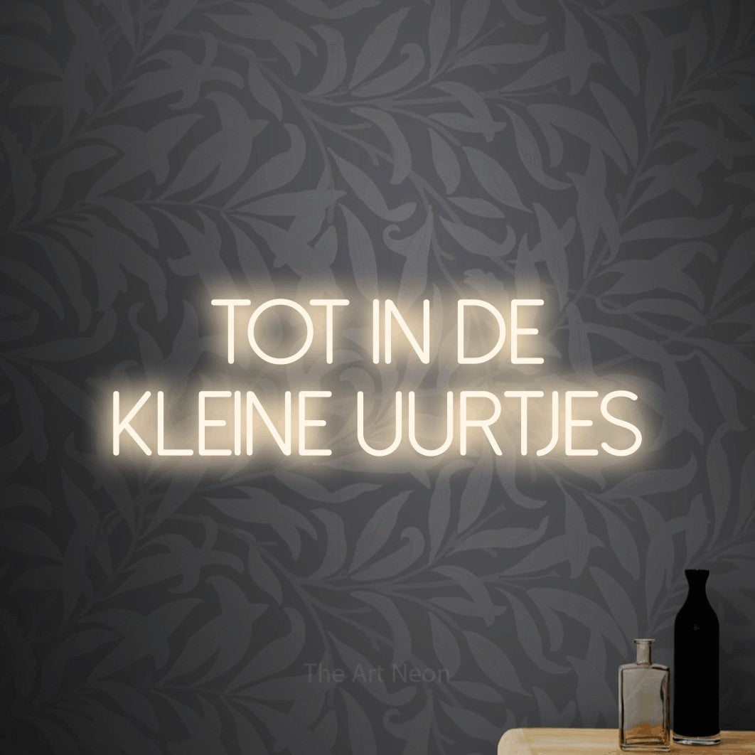 LED neon sign reading “tot in de kleine uurtjes”, arranged in 2 lines.
