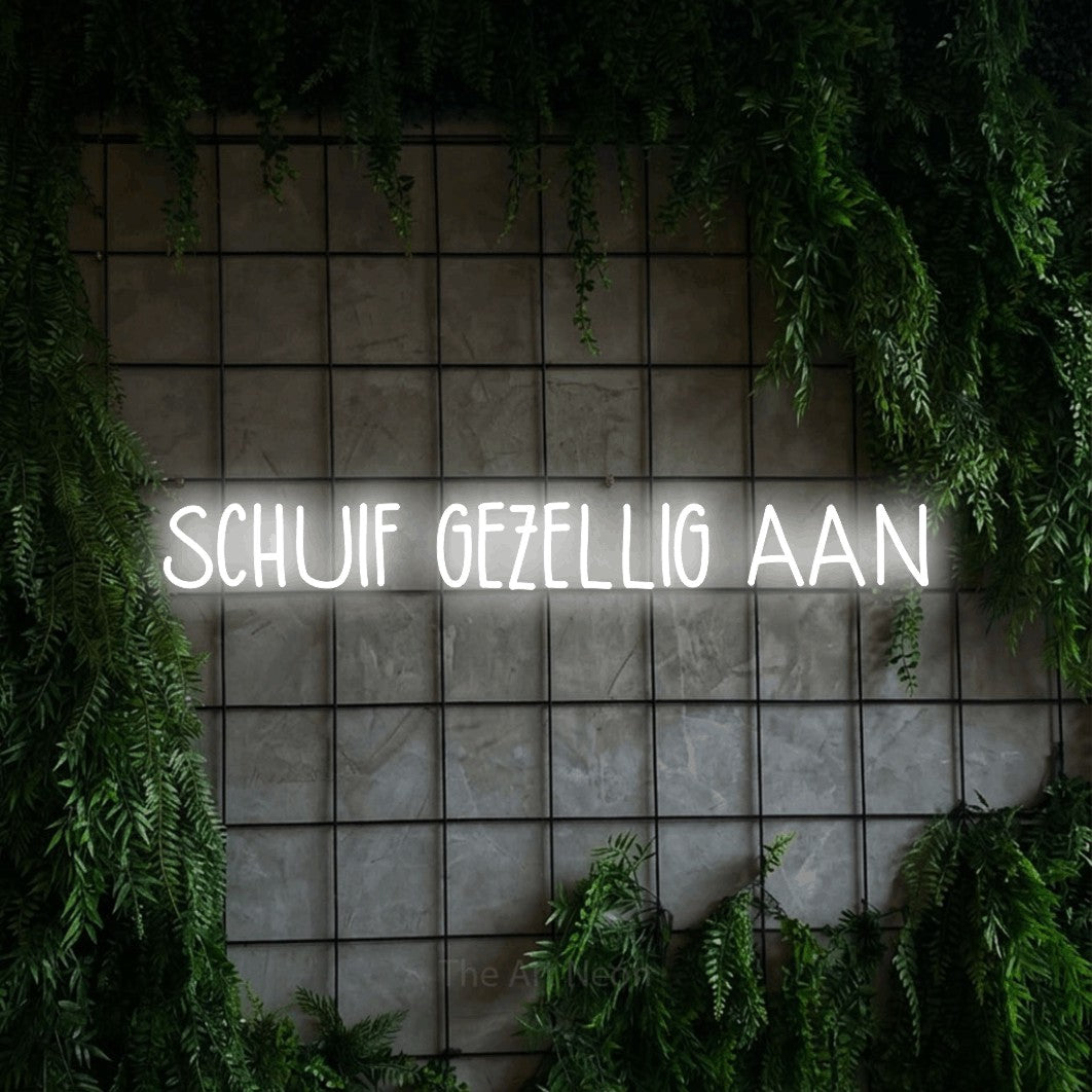 LED neon sign reading “SCHUIF GEZELLIG AAN”, arranged in a single line.