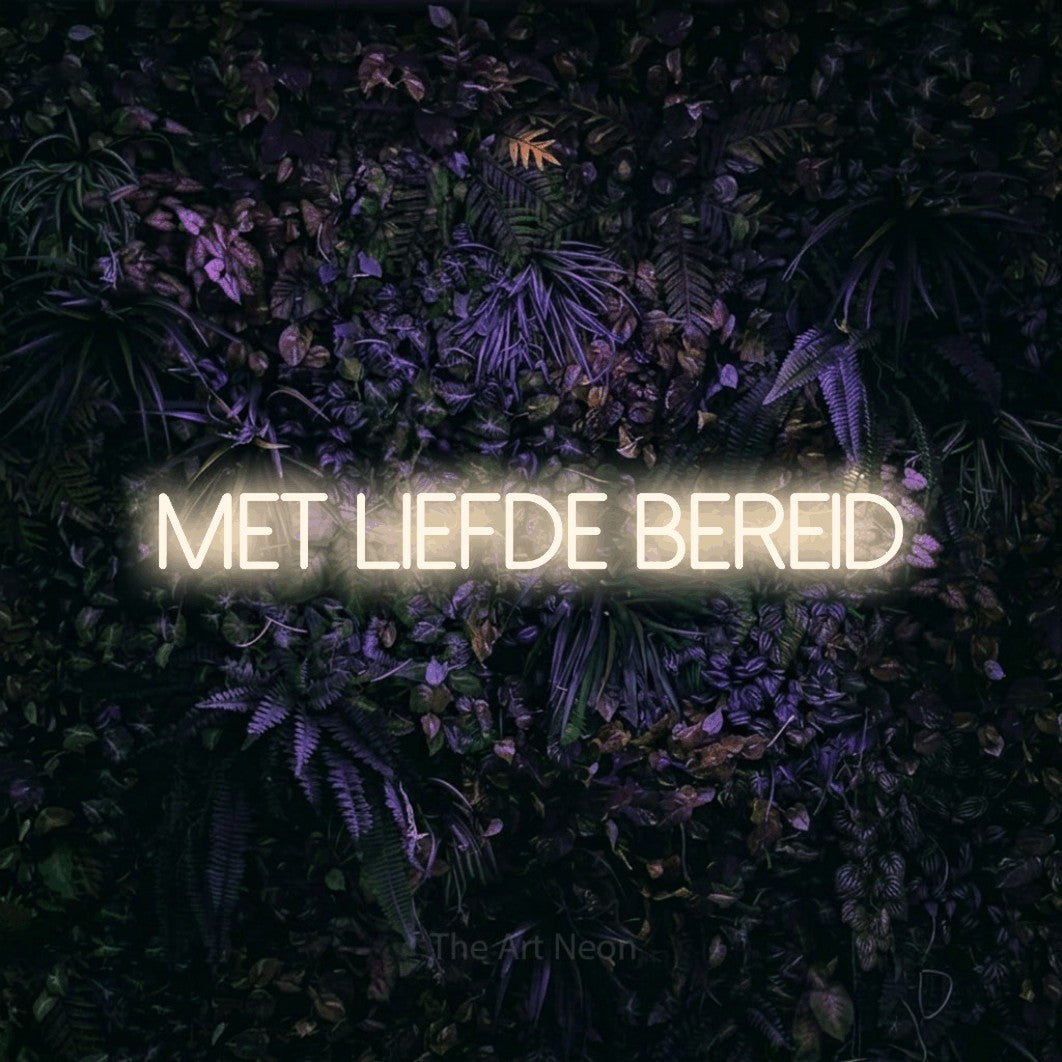 LED neon sign reading “Met Liefde Bereid”, arranged in a single line.