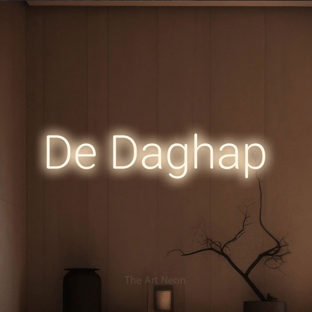 LED neon sign reading “De Daghap”, arranged in a single line.