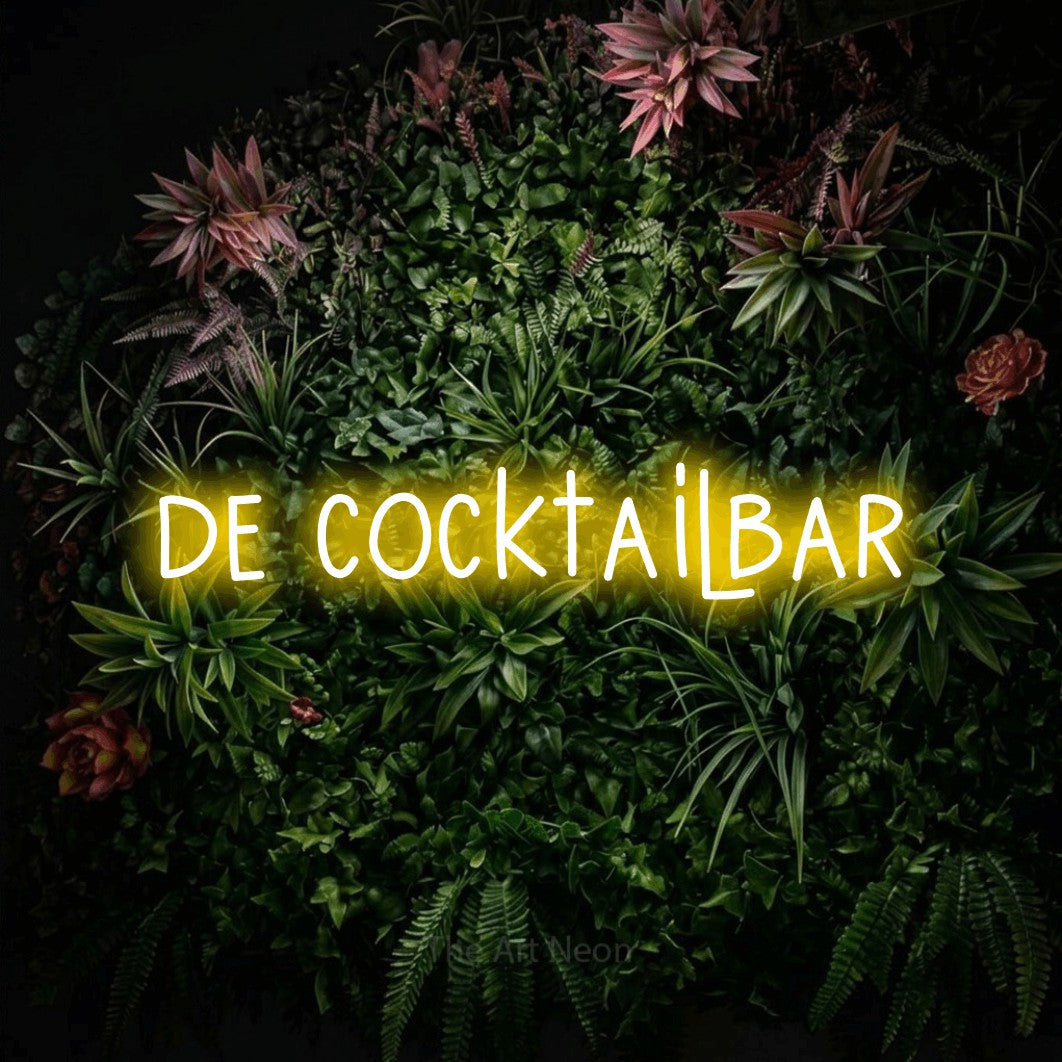 LED neon sign reading “de cocktailbar”, arranged in a single line.