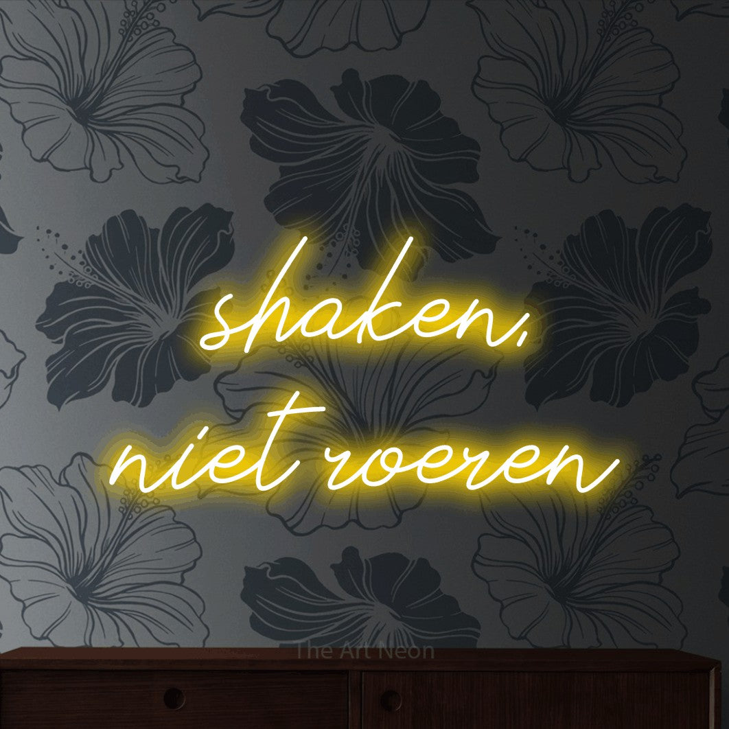 LED neon sign reading “shaken, niet roeren”, arranged in 2 lines.