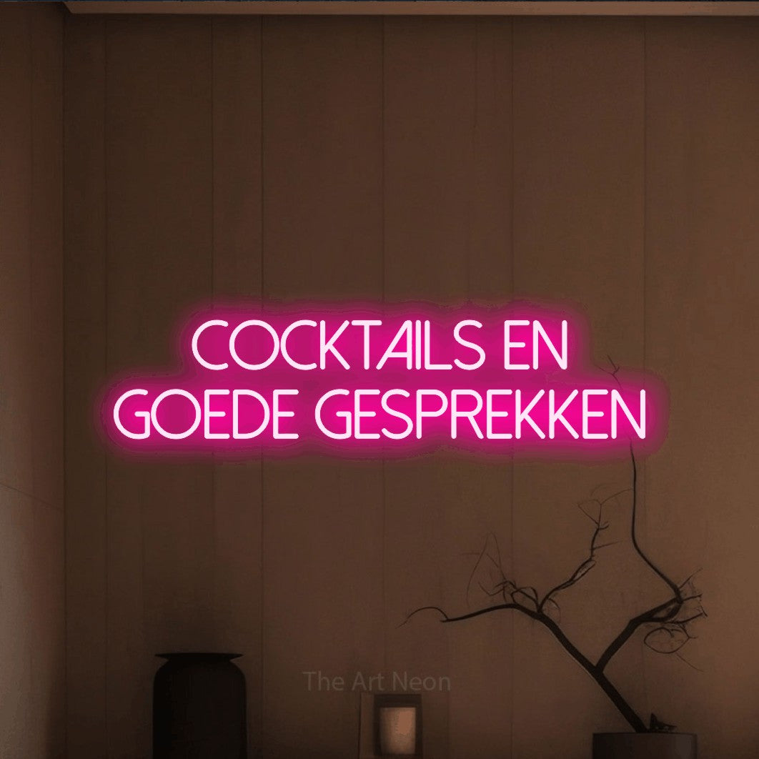 LED neon sign reading “cocktails en goede gesprekken”, arranged in 2 lines.