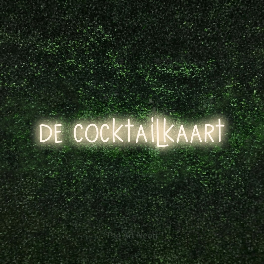 LED neon sign reading “de cocktailkaart”, arranged in a single line.