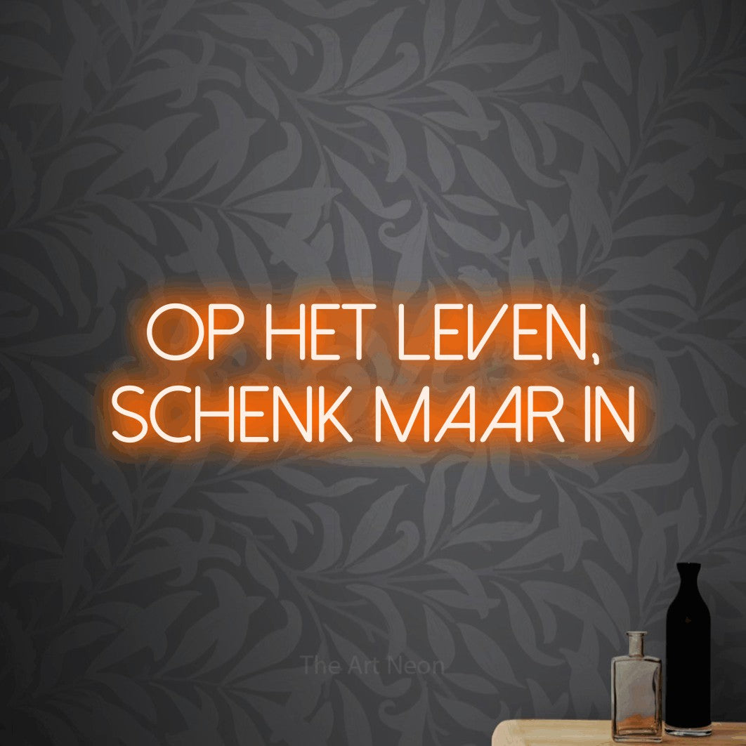 LED neon sign reading “op het leven, schenk maar in”, arranged in 2 lines.