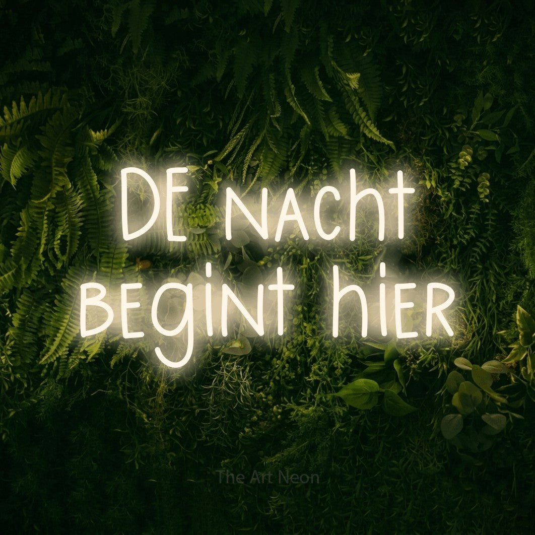 LED neon sign reading “DE nacht begint hier”, arranged in 2 lines.