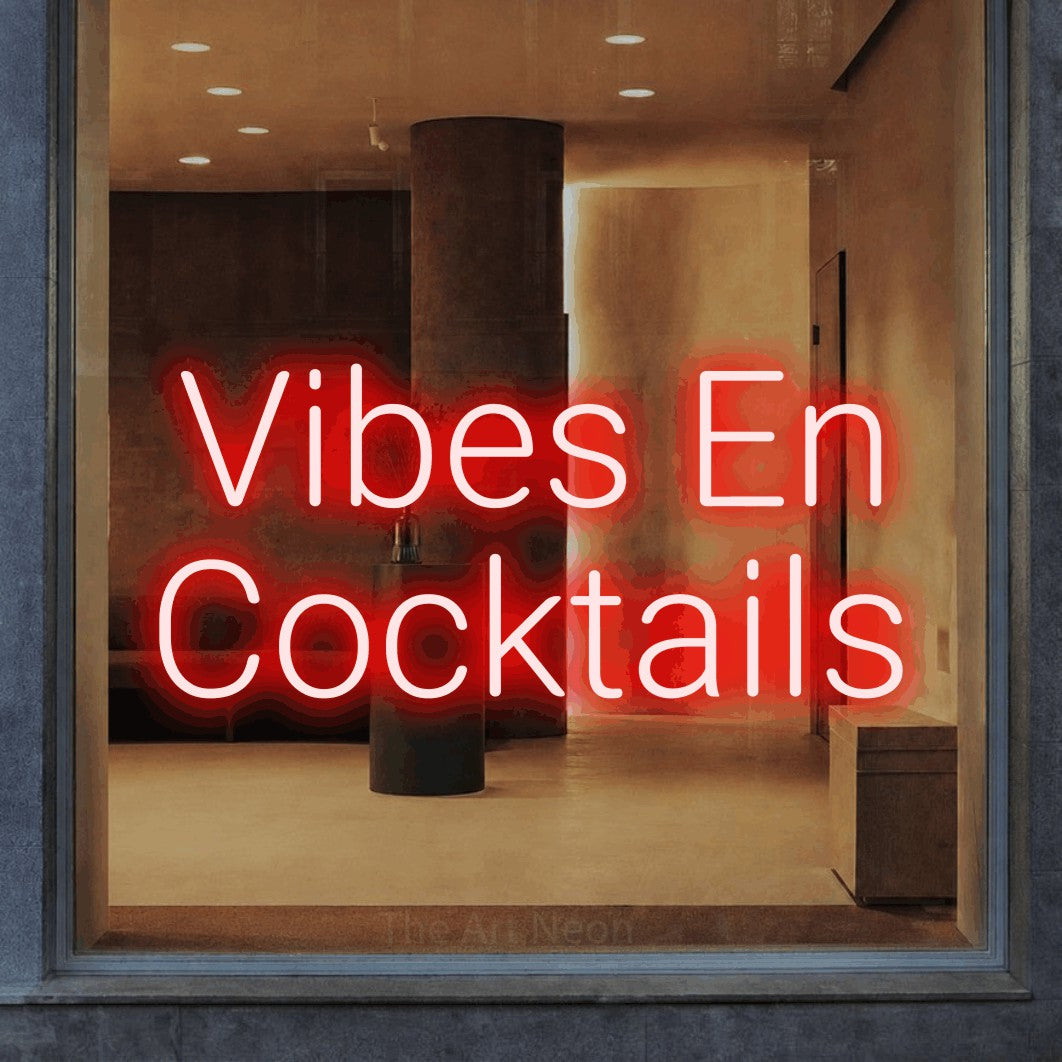 LED neon sign reading “Vibes En Cocktails”, arranged in 2 lines.