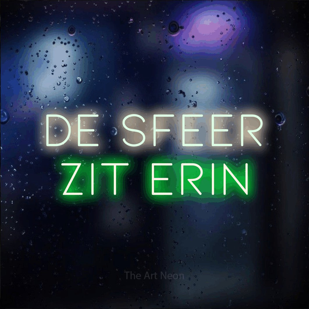 LED neon sign reading “DE SFEER ZIT ERIN”, arranged in 2 lines.