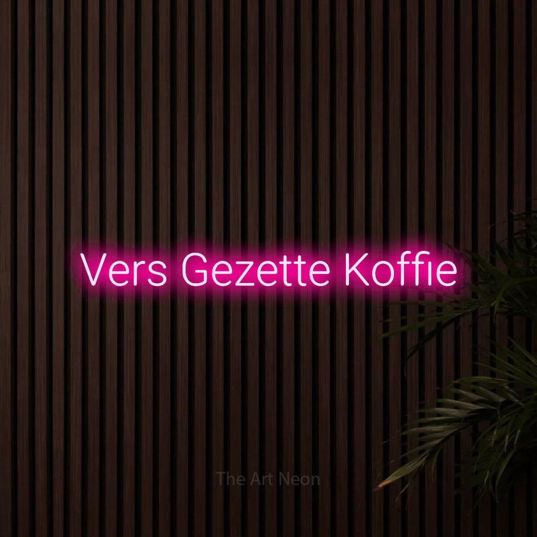 LED neon sign reading “Vers Gezette Koffie”, arranged in a single line.