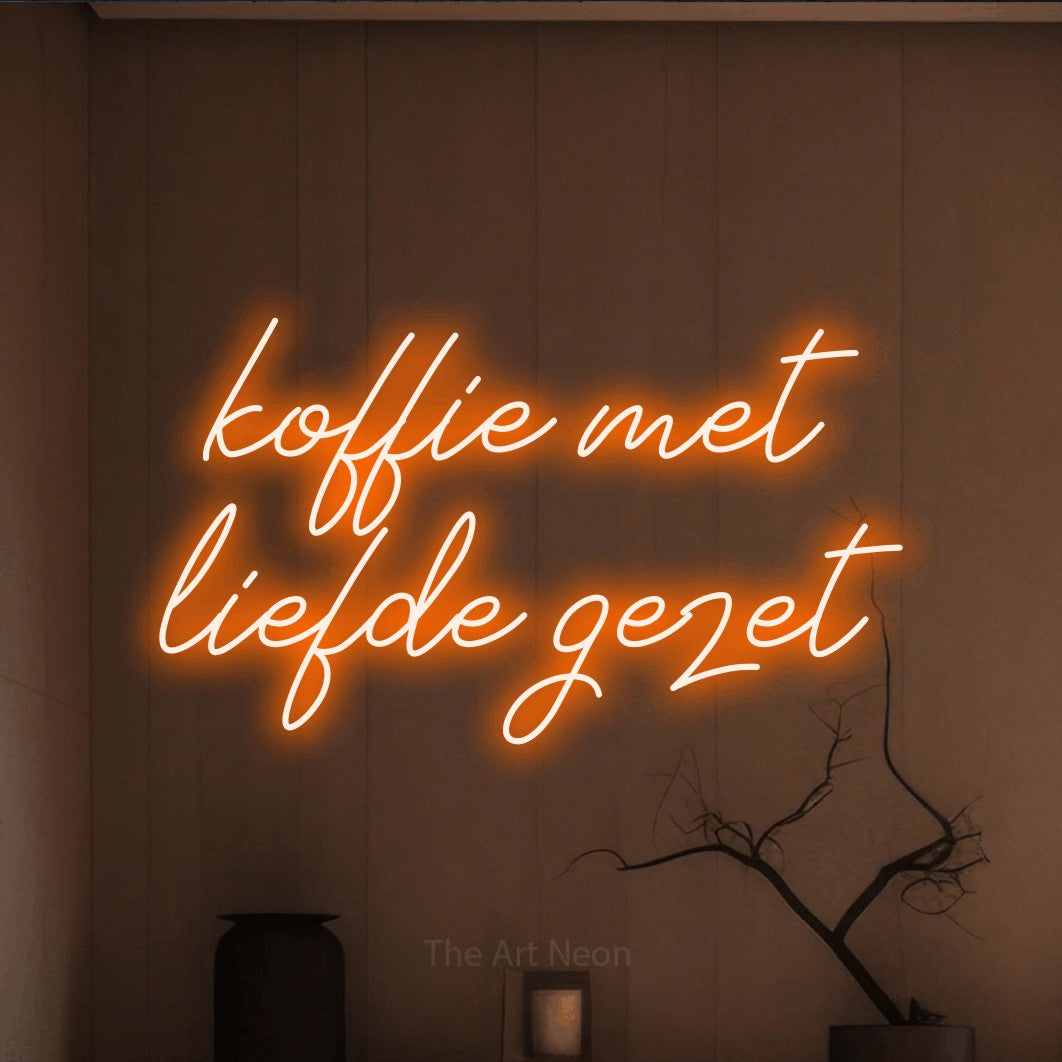 LED neon sign reading “koffie met liefde gezet”, arranged in 2 lines.
