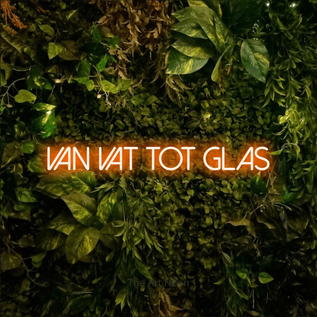 LED neon sign reading “VAN vat tot glas”, arranged in a single line.