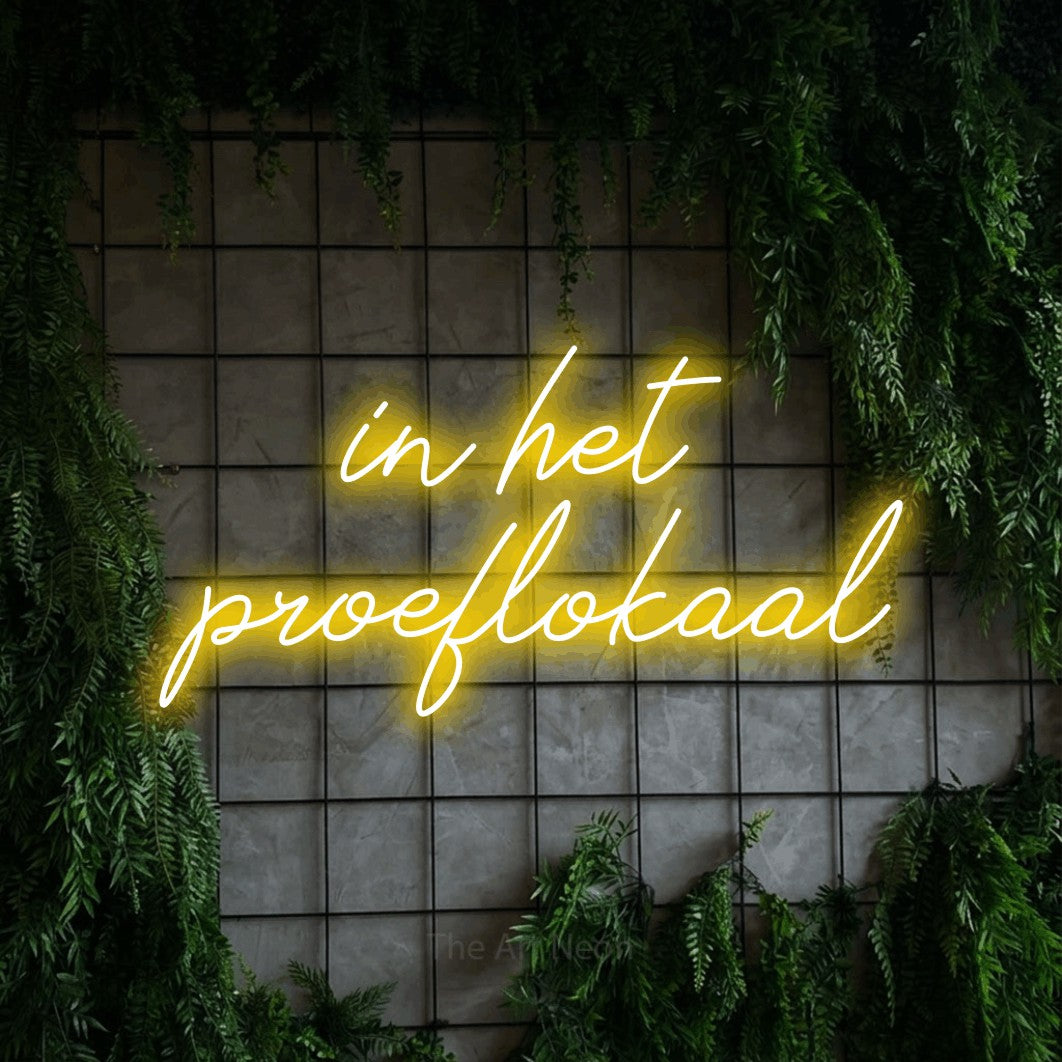 LED neon sign reading “in het proeflokaal”, arranged in 2 lines.
