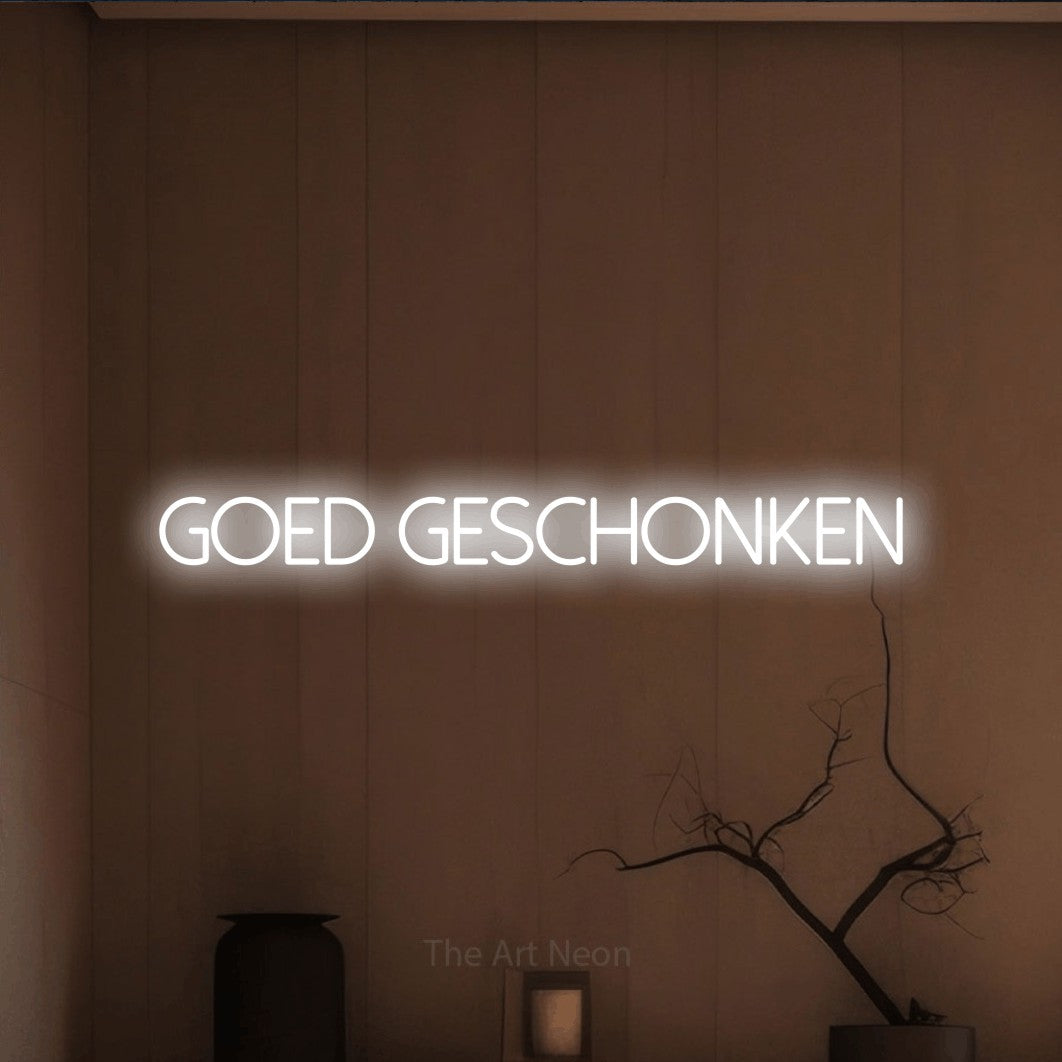 LED neon sign reading “GOED geschonken”, arranged in a single line.