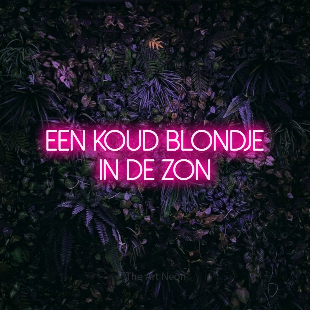 LED neon sign reading “Een Koud Blondje In De Zon”, arranged in 2 lines.