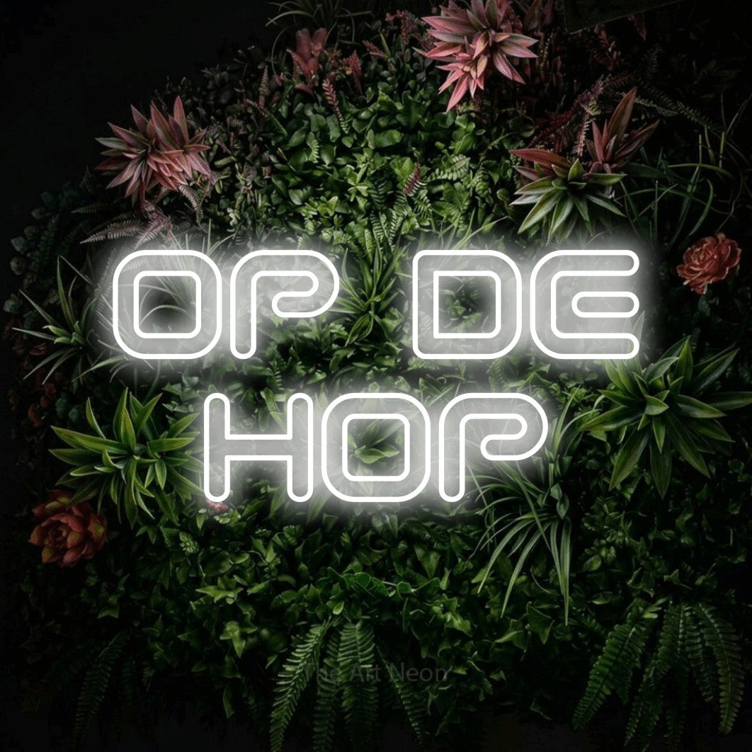 LED neon sign reading “OP DE HOP”, arranged in 2 lines.