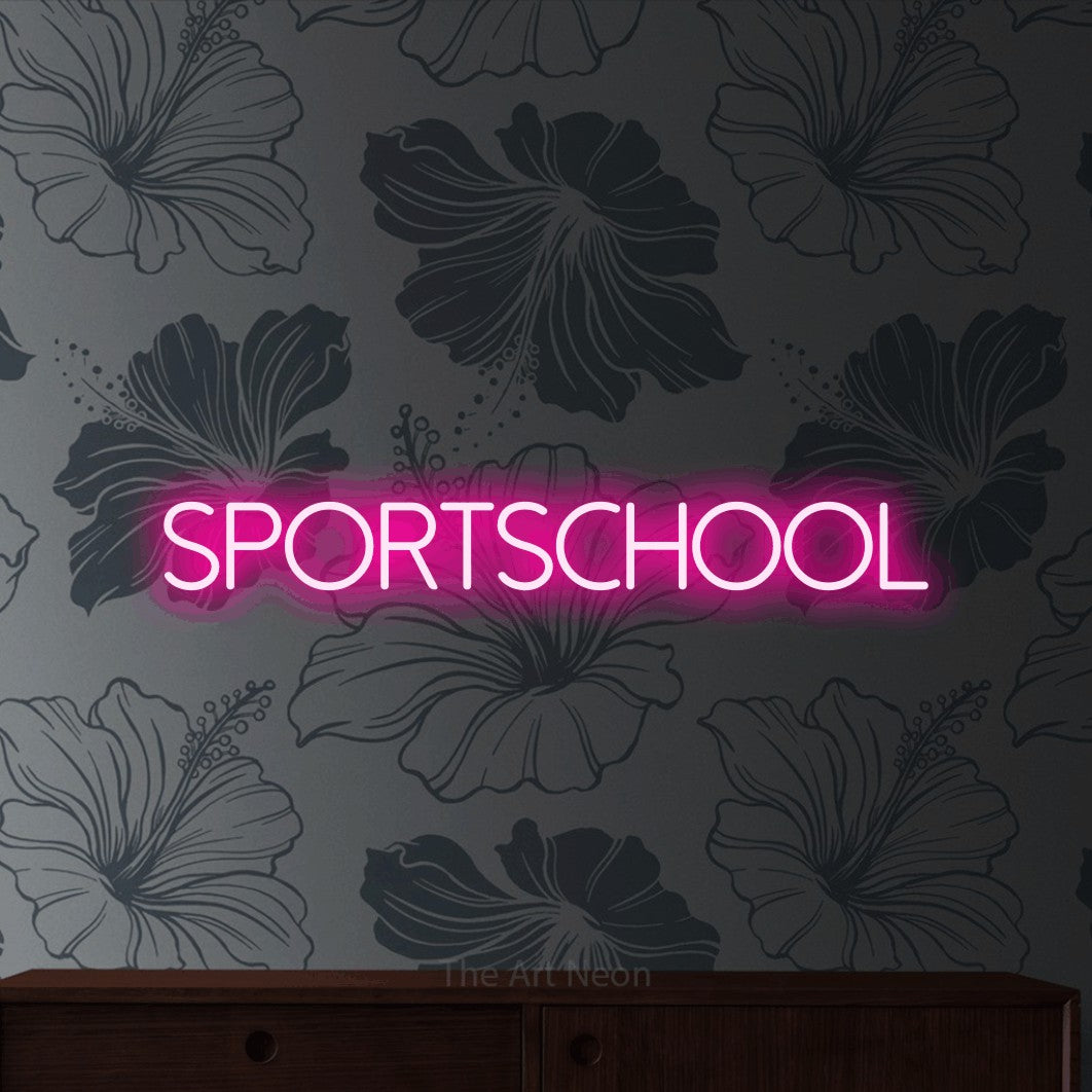 LED neon sign reading “SPORTSCHOOL”, arranged in a single line.