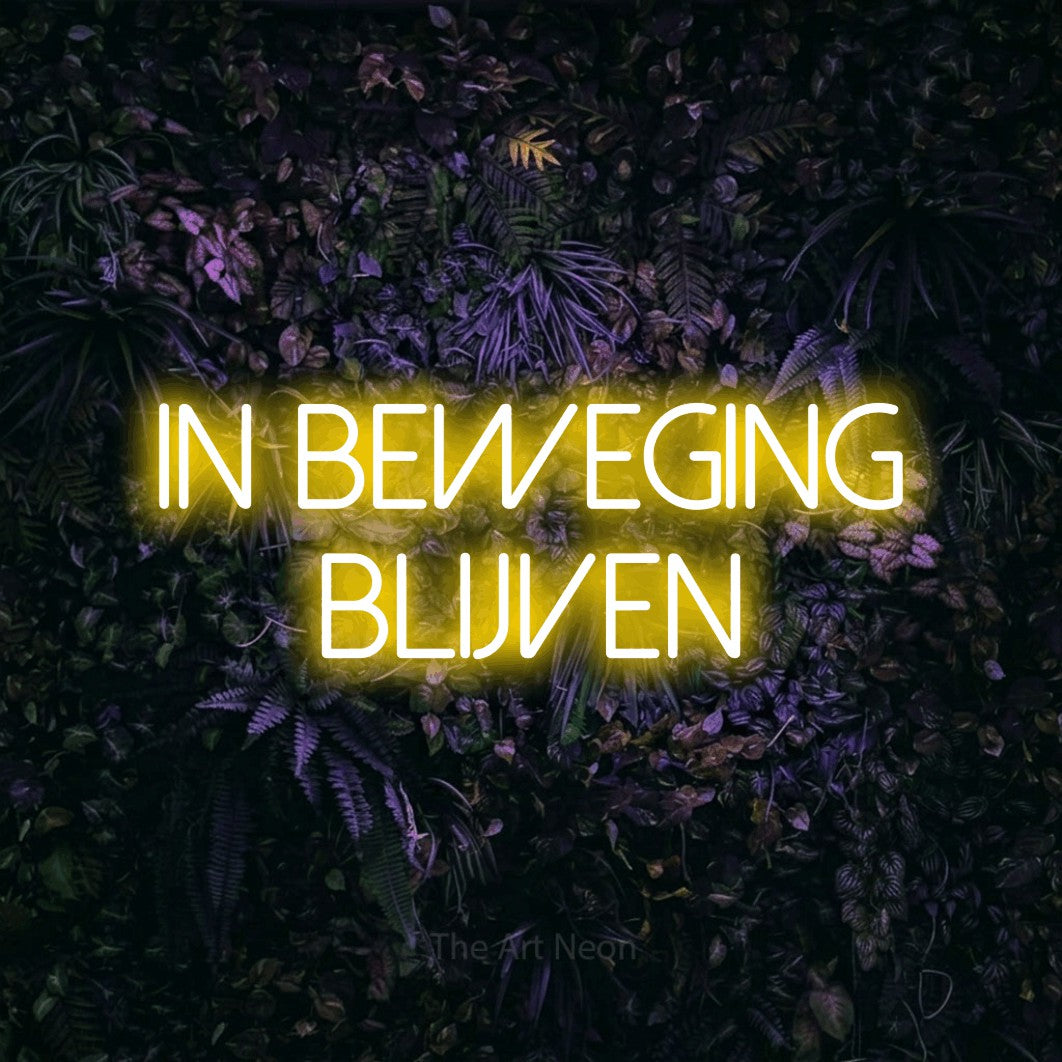 LED neon sign reading “IN BEWEGING BLIJVEN”, arranged in 2 lines.