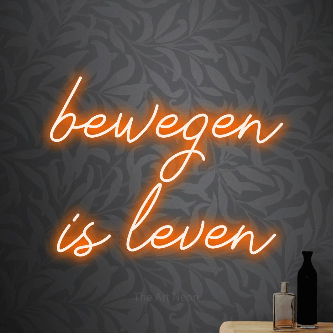 LED neon sign reading “bewegen is leven”, arranged in 2 lines.