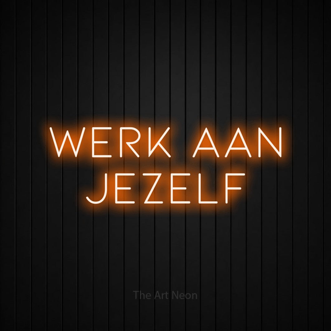 LED neon sign reading “WERK AAN JEZELF”, arranged in 2 lines.