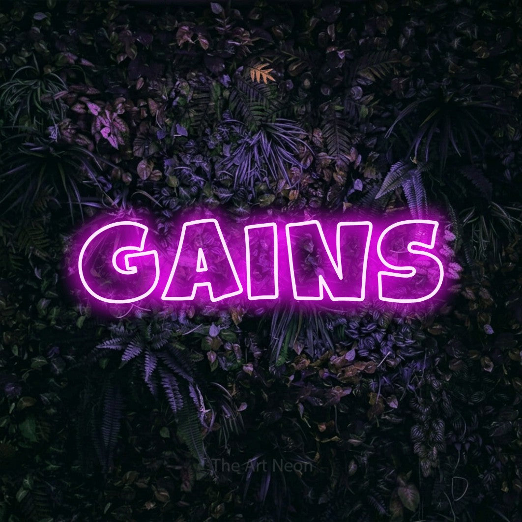 LED neon sign reading “GAINS”, arranged in a single line.