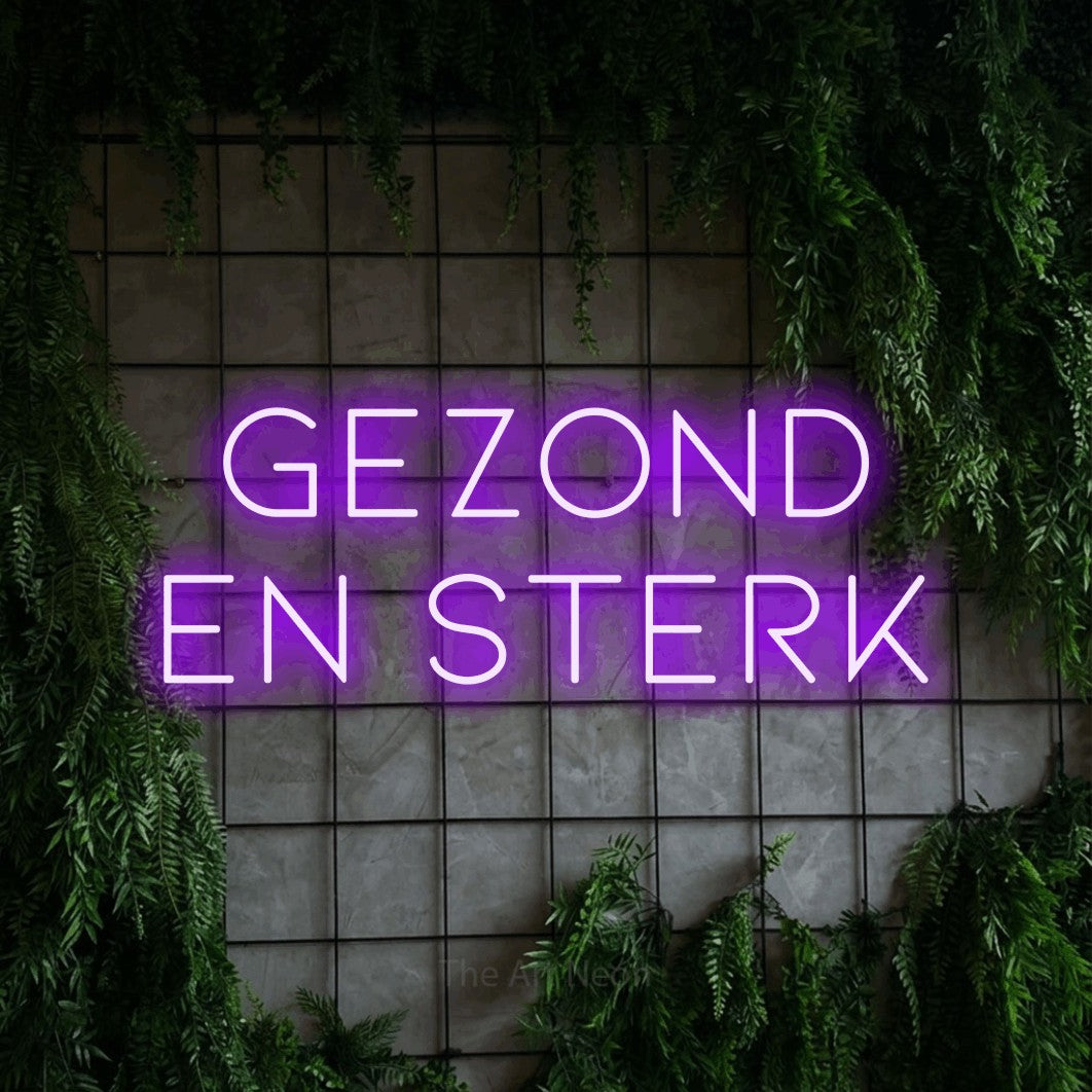 LED neon sign reading “GEZOND EN STERK”, arranged in 2 lines.
