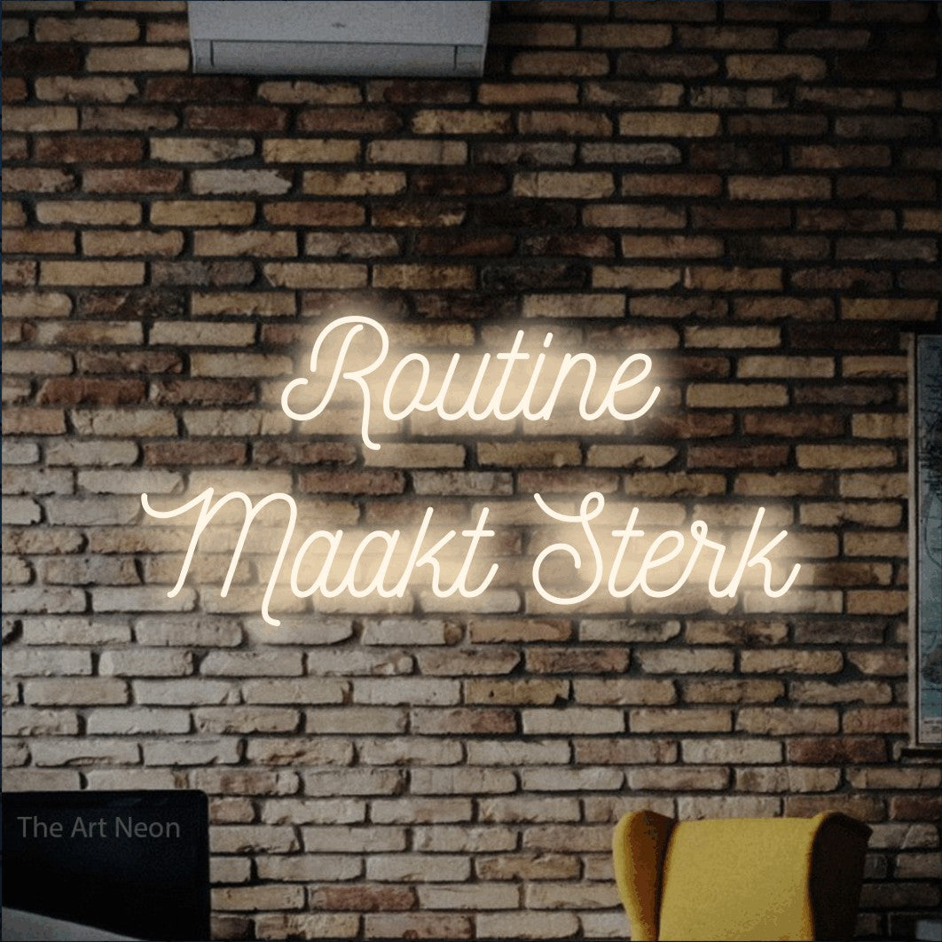 LED neon sign reading “Routine Maakt Sterk”, arranged in 2 lines.