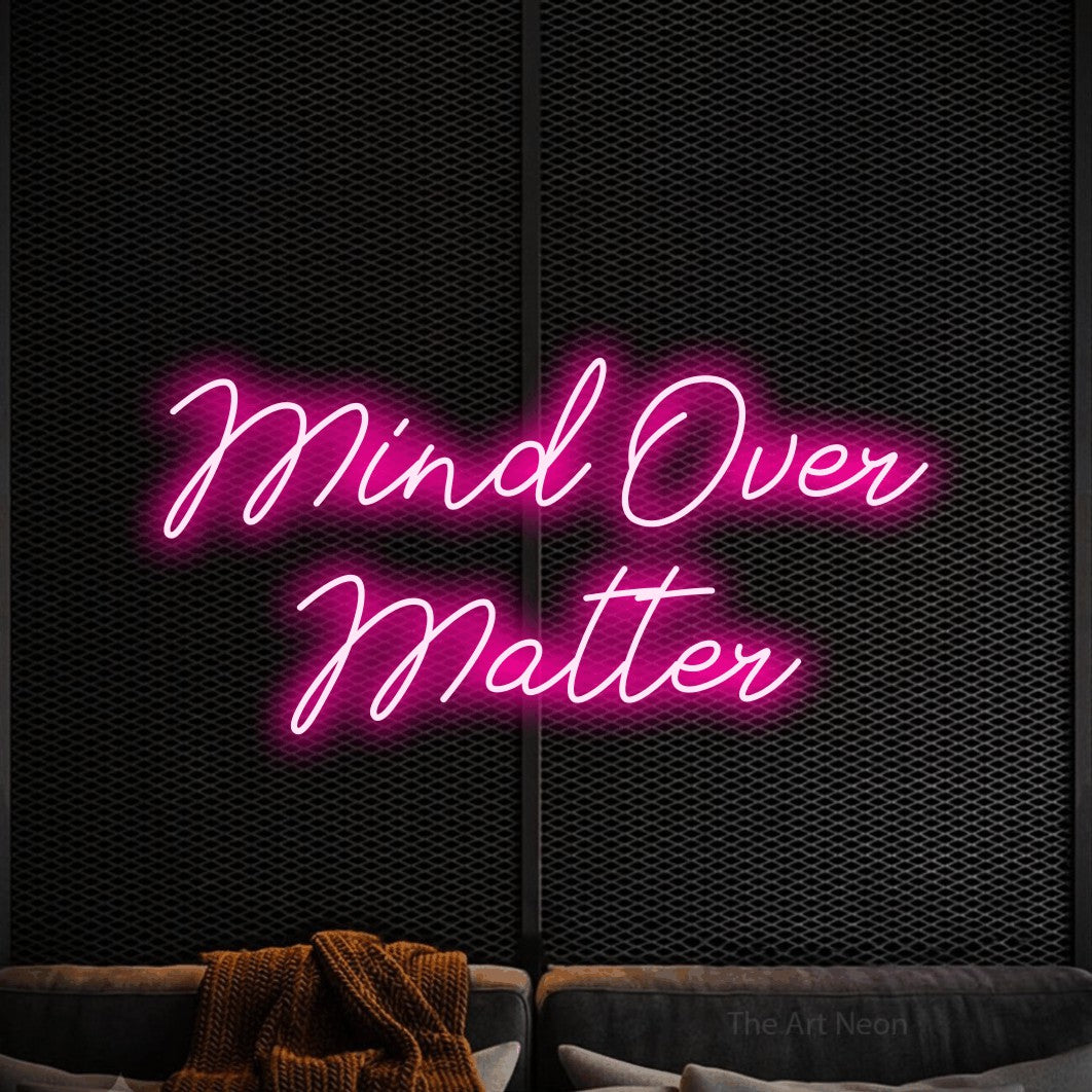 LED neon sign reading “Mind Over Matter”, arranged in 2 lines.