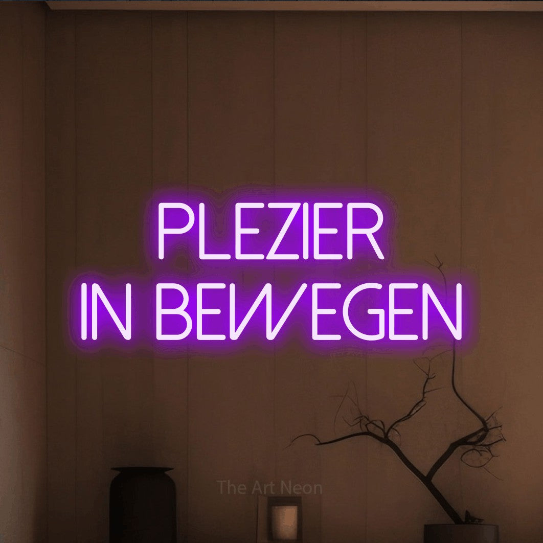 LED neon sign reading “PLEZIER in bewegen”, arranged in 2 lines.