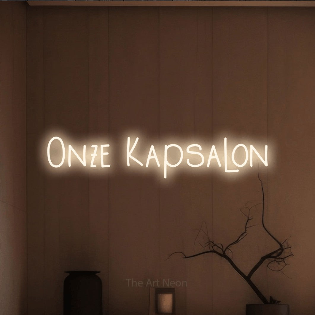 LED neon sign reading “Onze Kapsalon”, arranged in a single line.