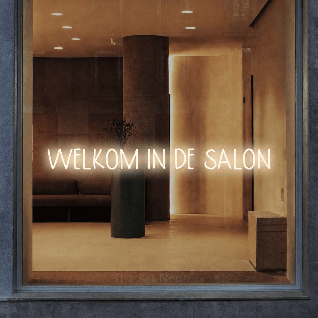 LED neon sign reading “WELKOM IN DE SALON”, arranged in a single line.