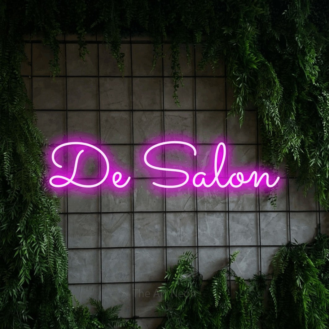 LED neon sign reading “De Salon”, arranged in a single line.