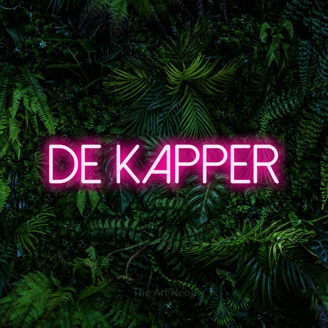 LED neon sign reading “DE kapper”, arranged in a single line.