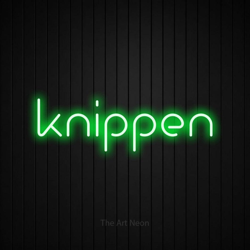 LED neon sign reading “knippen”, arranged in a single line.