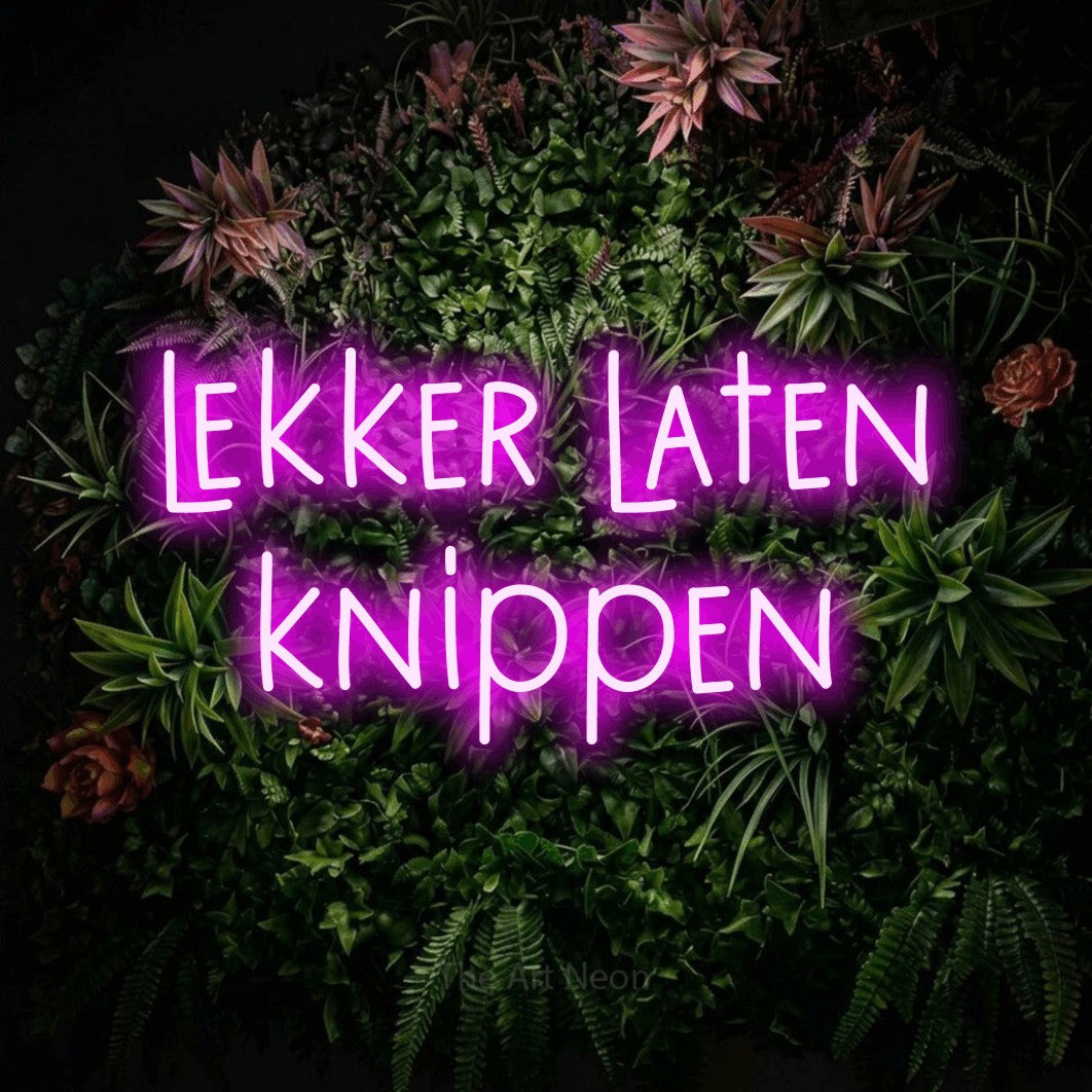 LED neon sign reading “lekker laten knippen”, arranged in 2 lines.