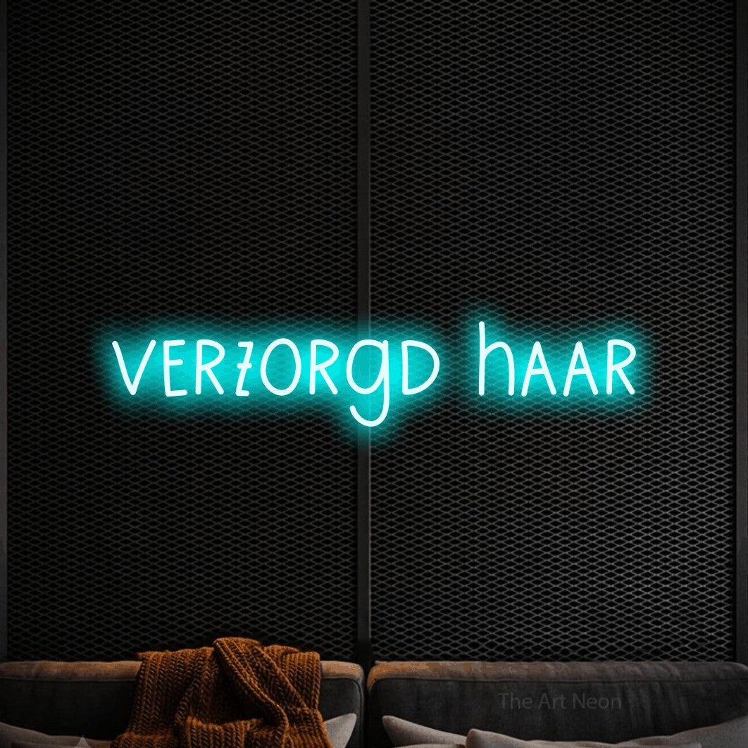 LED neon sign reading “verzorgd haar”, arranged in a single line.