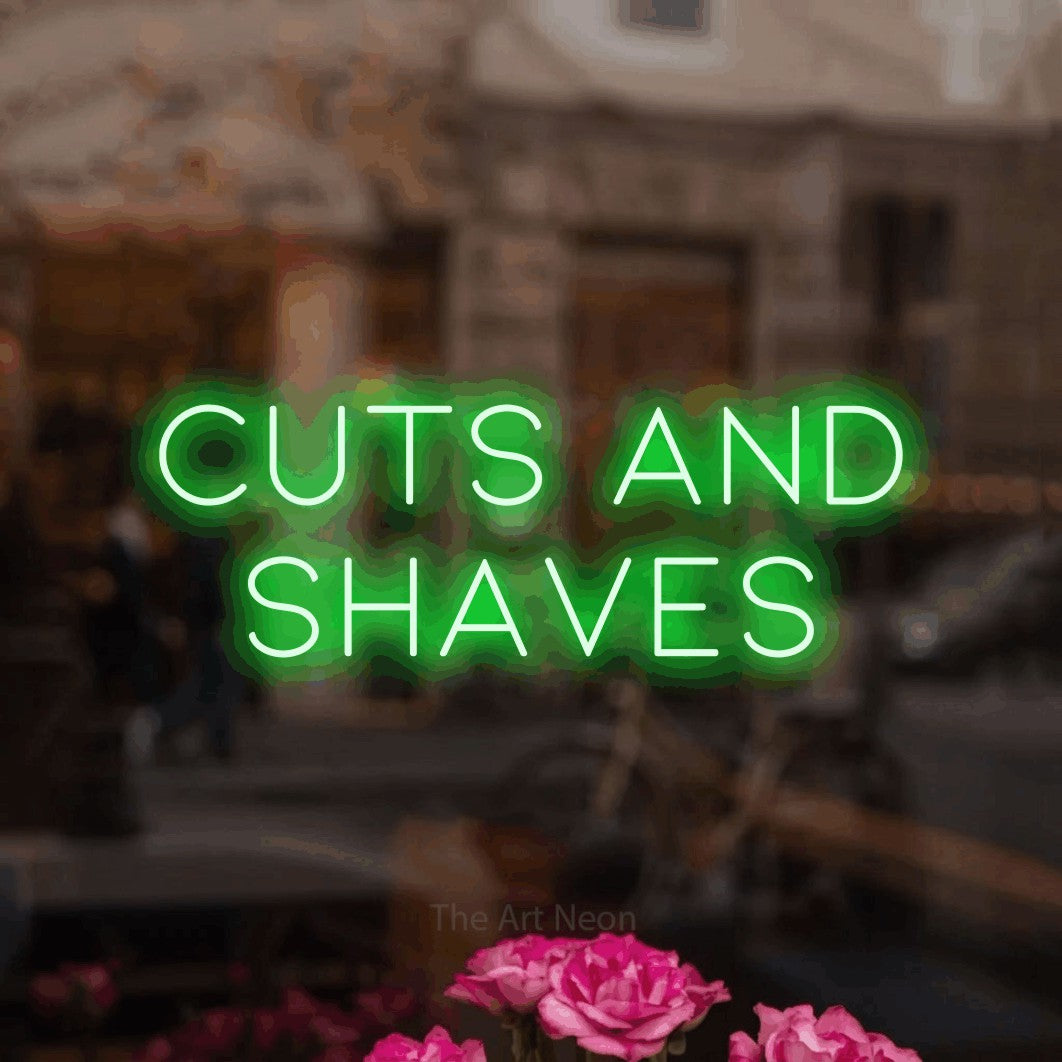 LED neon sign reading “CUTS AND SHAVES”, arranged in 2 lines.