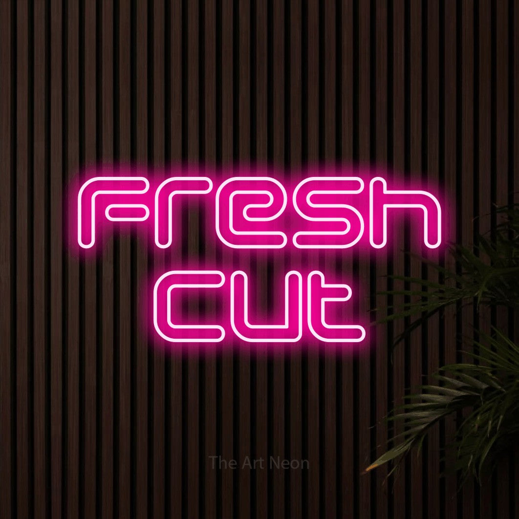 LED neon sign reading “Fresh cut”, arranged in 2 lines.