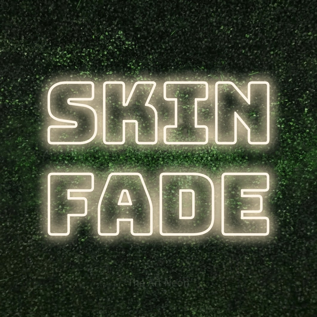 LED neon sign reading “Skin Fade”, arranged in 2 lines.