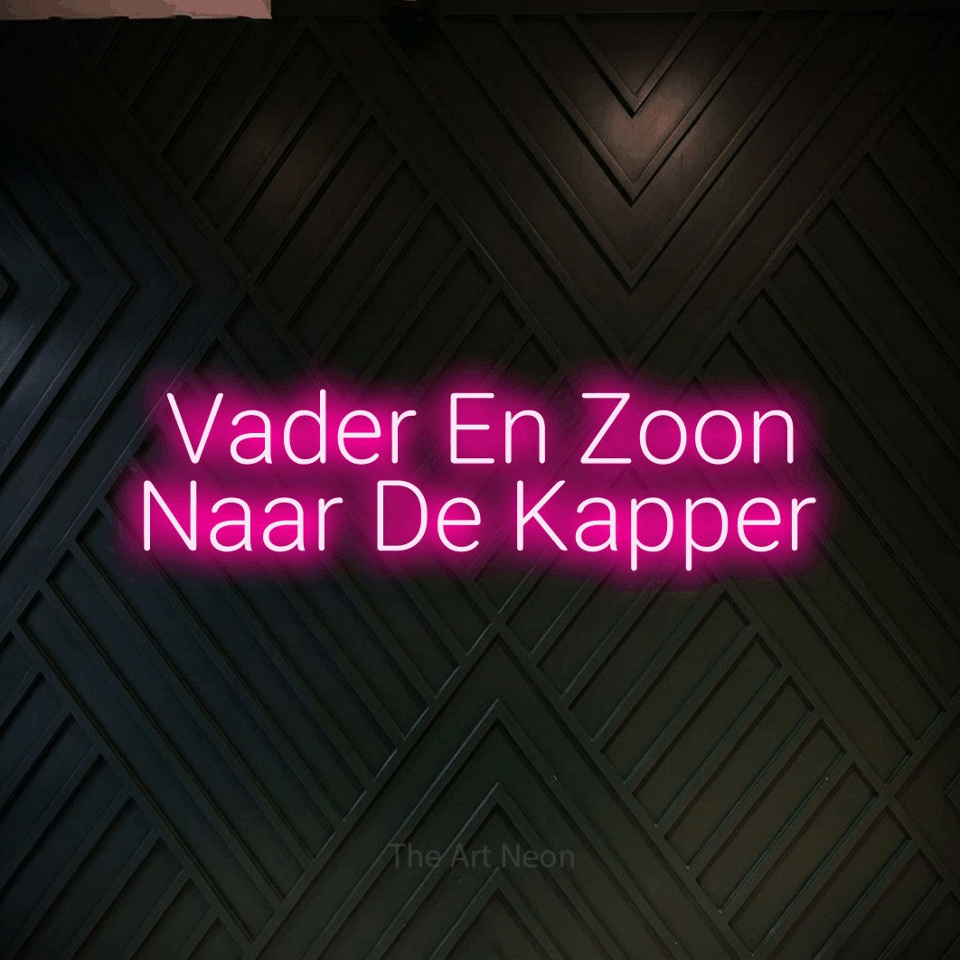 LED neon sign reading “Vader En Zoon Naar De Kapper”, arranged in 2 lines.
