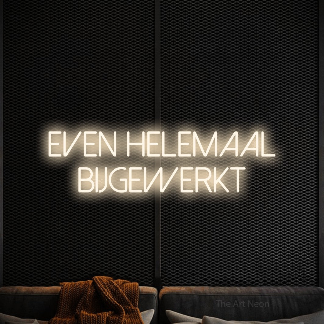 LED neon sign reading “even helemaal bijgewerkt”, arranged in 2 lines.