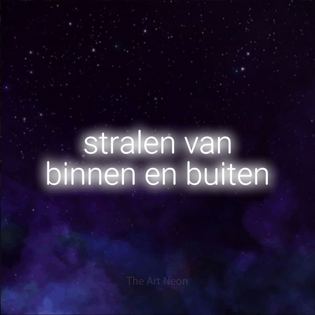 LED neon sign reading “stralen van binnen en buiten”, arranged in 2 lines.