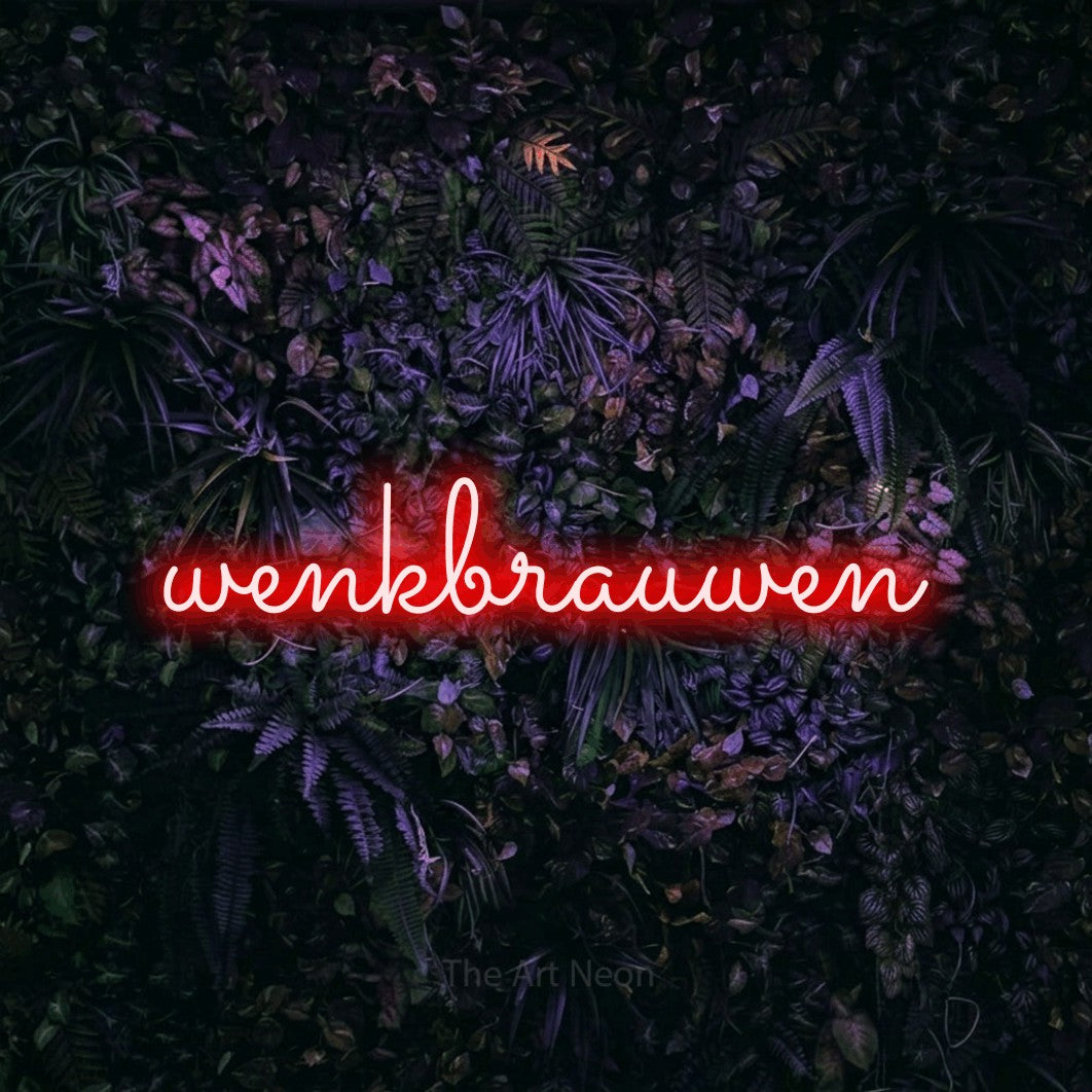 LED neon sign reading “wenkbrauwen”, arranged in a single line.