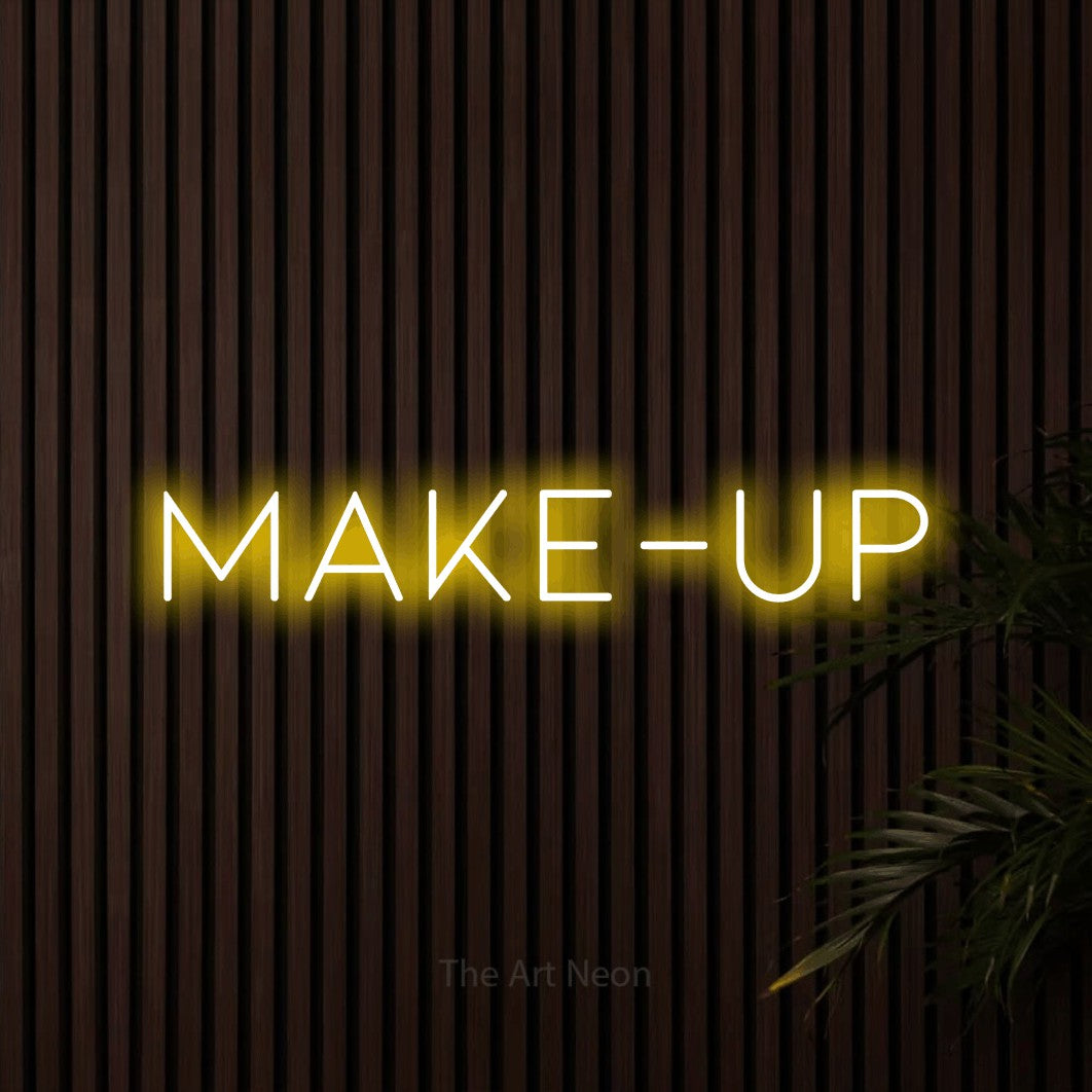 LED neon sign reading “MAKE-UP”, arranged in a single line.