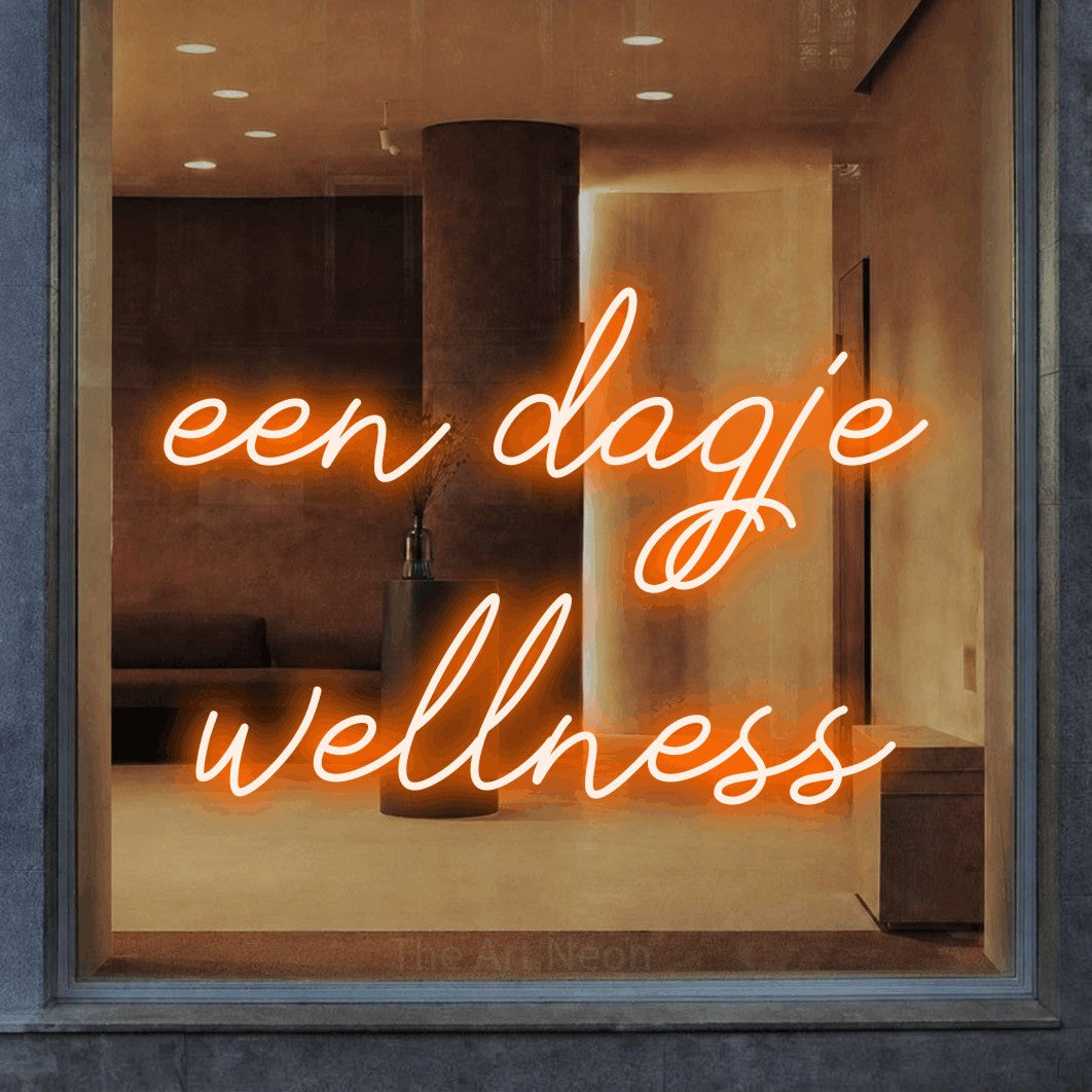 LED neon sign reading “een dagje wellness”, arranged in 2 lines.
