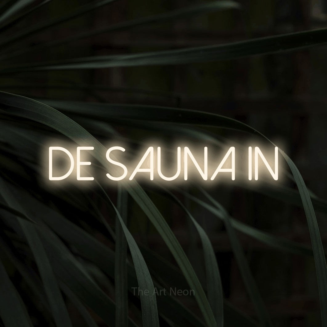 LED neon sign reading “De Sauna In”, arranged in a single line.