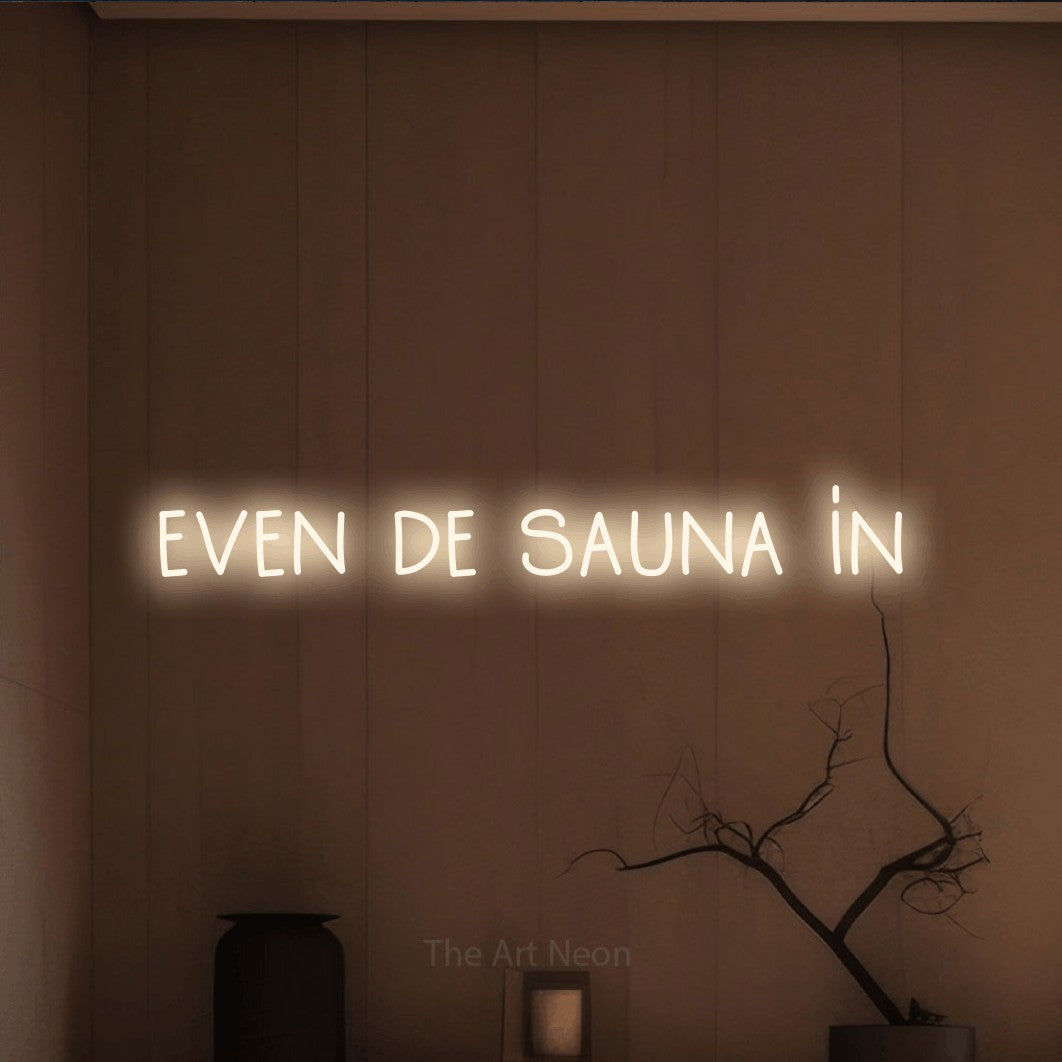 LED neon sign reading “even de sauna in”, arranged in a single line.